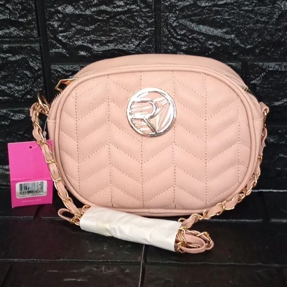 Rampage oval pale pink crossbody chain mini handbag
